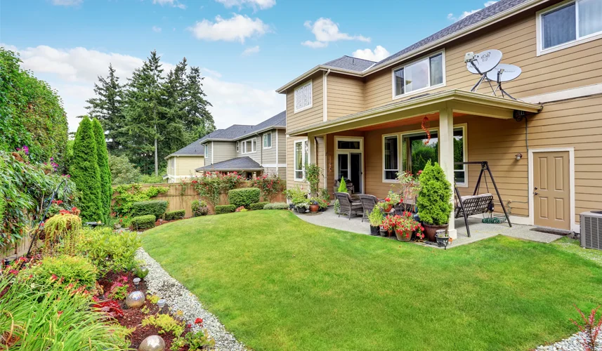 Backyard garden with comfortable sitting area by an expert landscape designer.