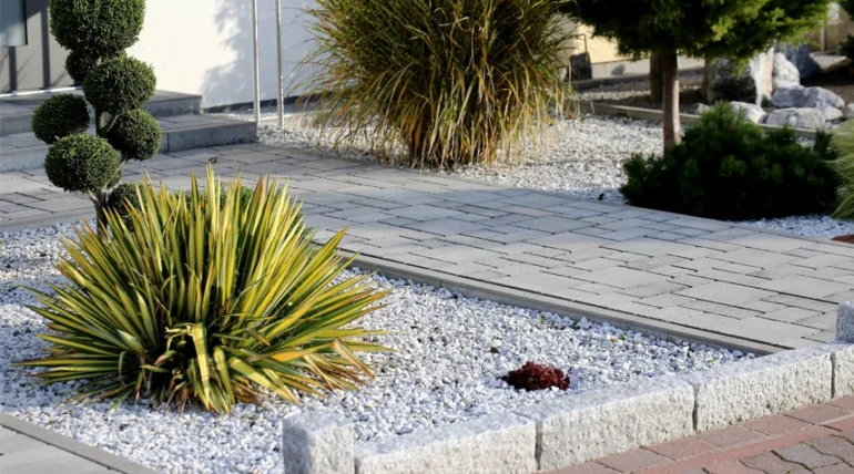 Modern front garden on a residential home. Landscaping Near Me services.