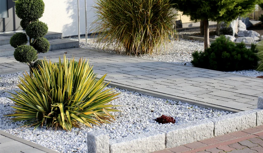 Modern front garden on a residential home. Landscaping Near Me services.