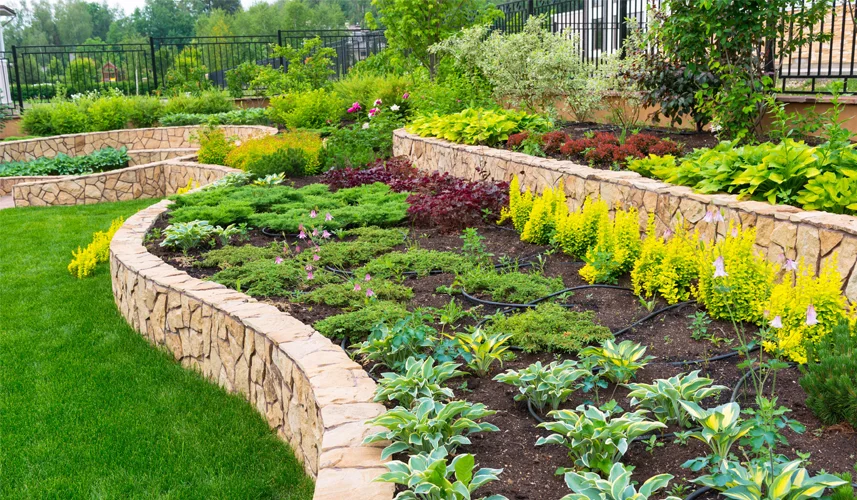 Natural stone landscaping services in home garden.